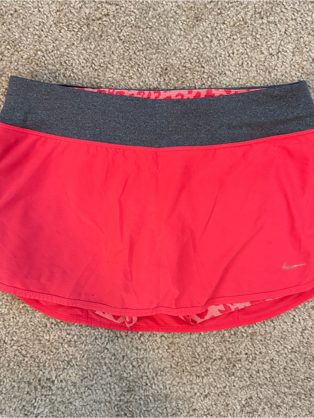 Nike red & pink leopard print mini skirt, size M